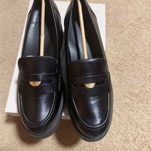 Black Leather Loafers with Gold Accent